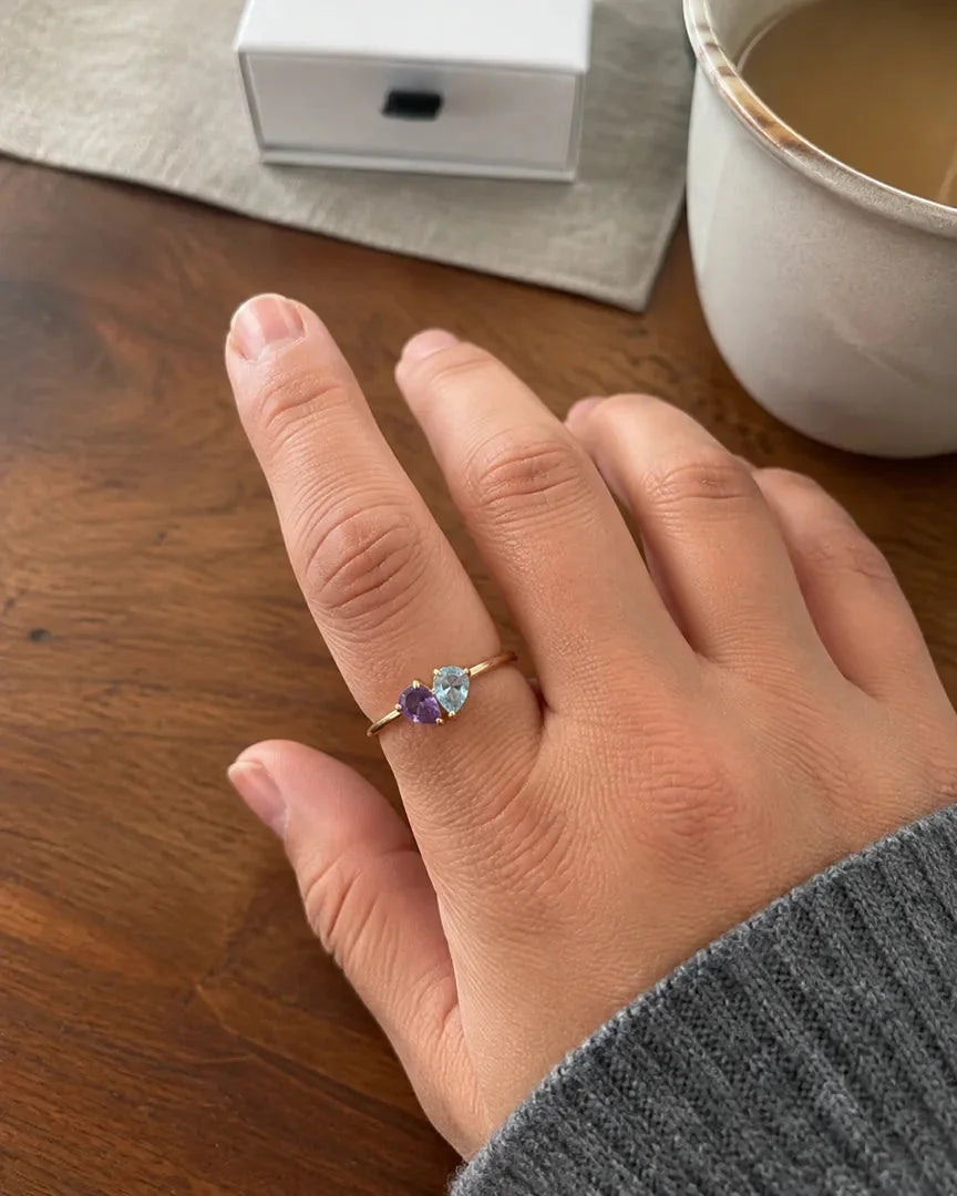 Customer wearing the Veria Ring with birthstones