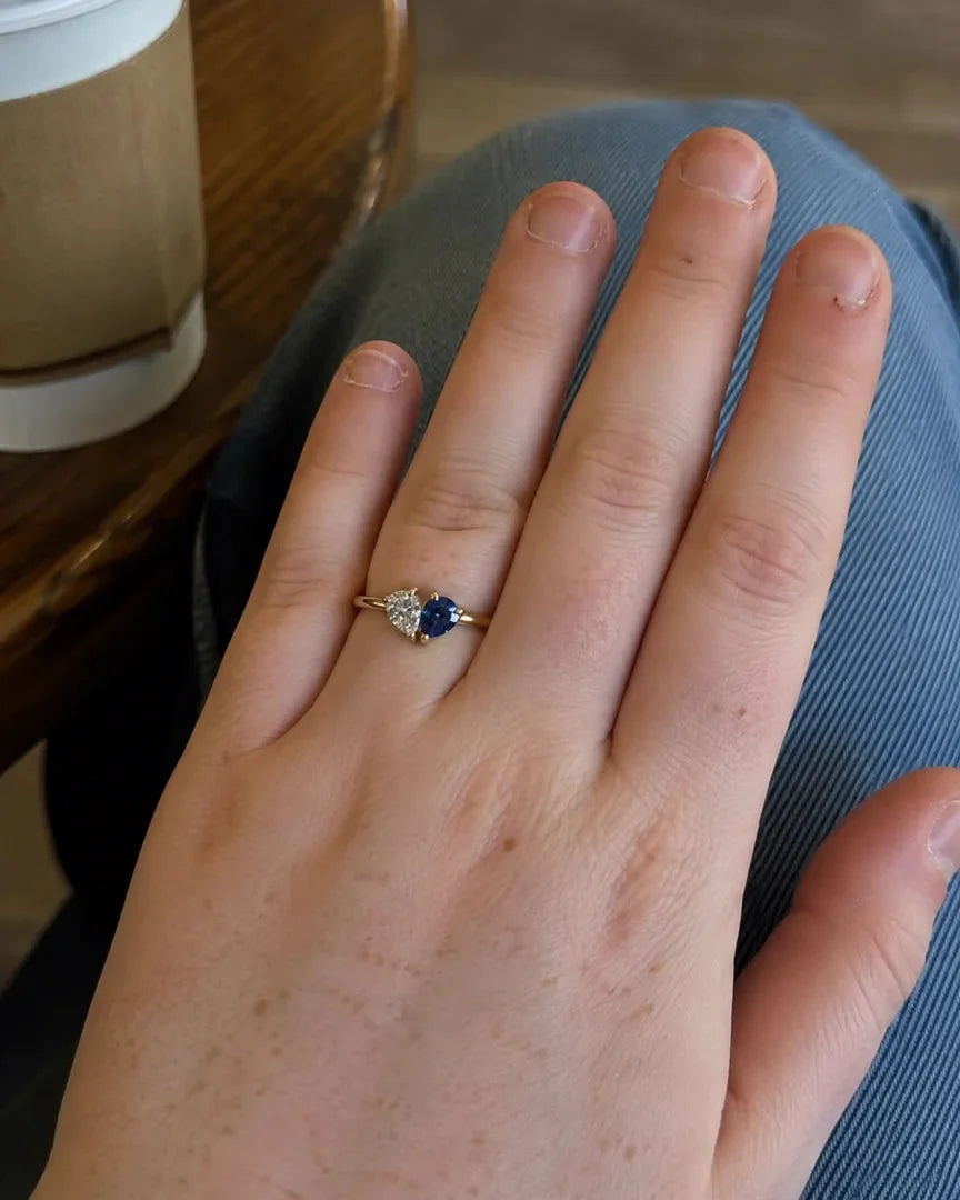 Customer wearing the Veria Ring with heart-shaped birthstones