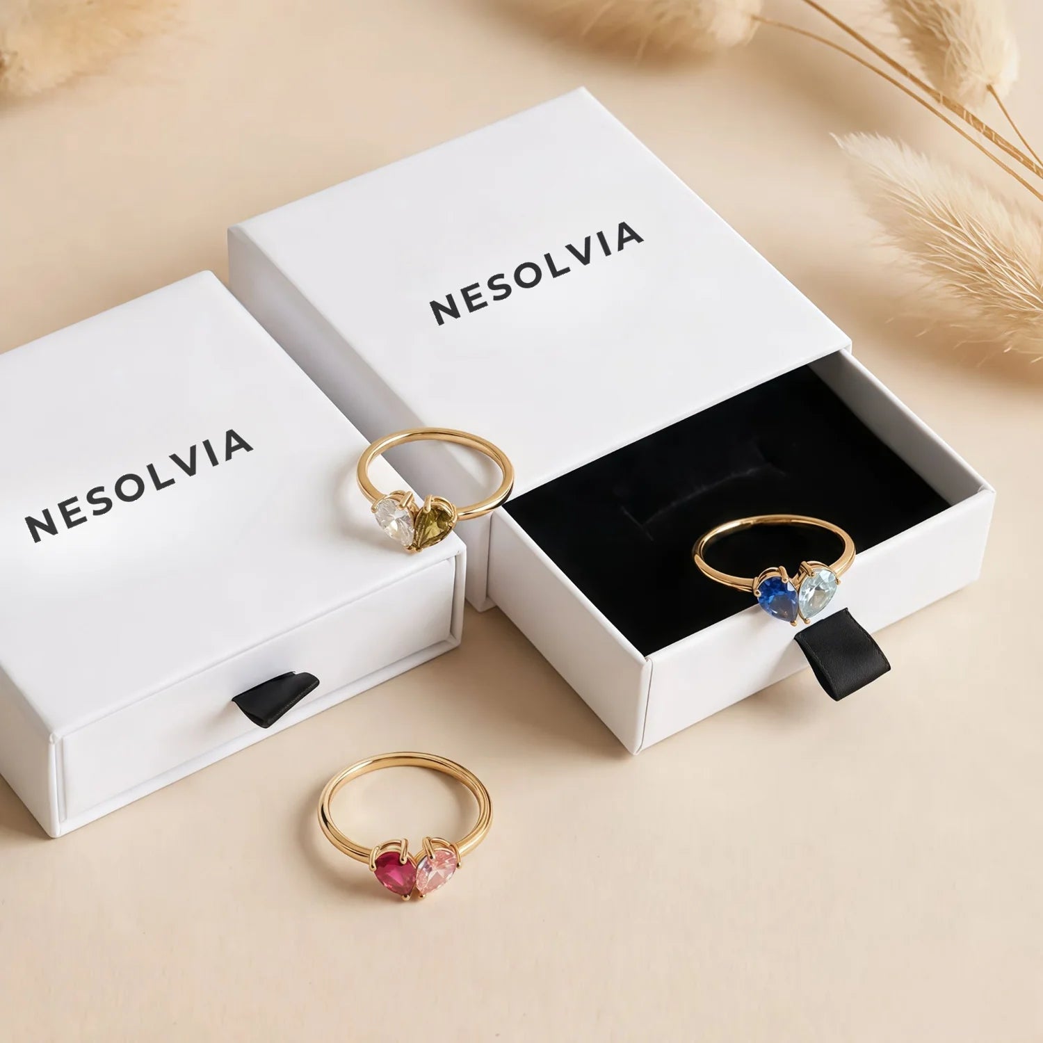 Veria rings in their Nesolvia box, with three birthstone combinations